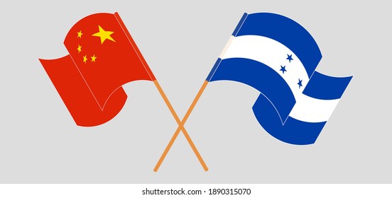 Crossed and waving flags of China and Honduras