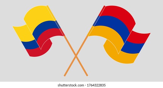 Crossed and waving flags of Colombia and Armenia