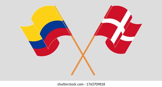 Crossed and waving flags of Colombia and Denmark