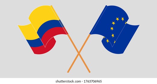 Crossed and waving flags of Colombia and the EU