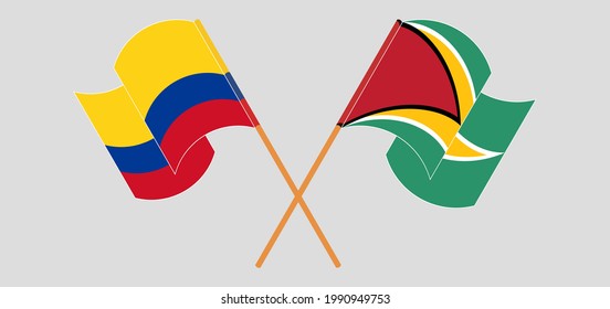 Crossed and waving flags of Colombia and Guyana
