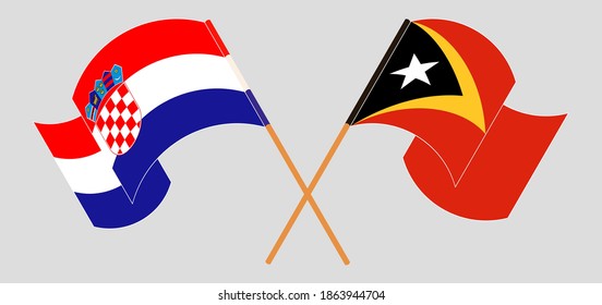 Crossed and waving flags of Croatia and East Timor