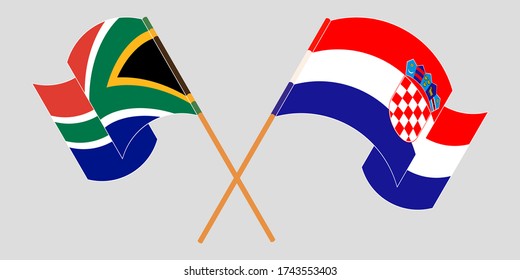 Überquerte und schwellende Flaggen Kroatiens und der RSA