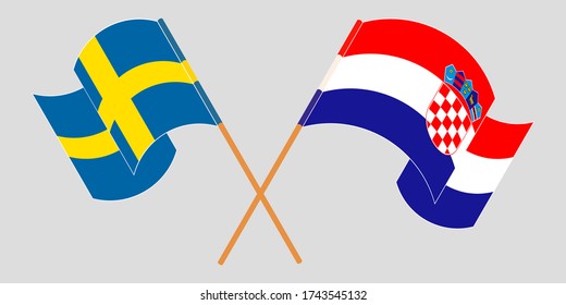 Crossed and waving flags of Croatia and Sweden