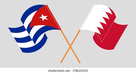Crossed and waving flags of Cuba and Bahrain