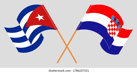 Banderas cruzadas y ondeando banderas de Cuba y Croacia