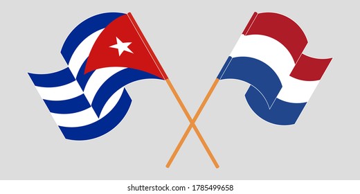 Banderas cruzadas y ondeando banderas de Cuba y los Países Bajos