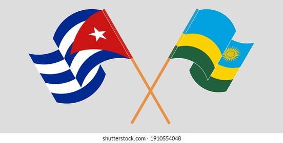 Crossed and waving flags of Cuba and Rwanda