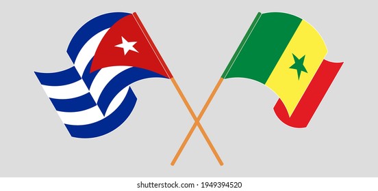 Cruzando y ondeando banderas de Cuba y Senegal