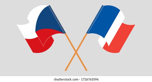 Banderas cruzadas y ondeando banderas de la República Checa y Francia