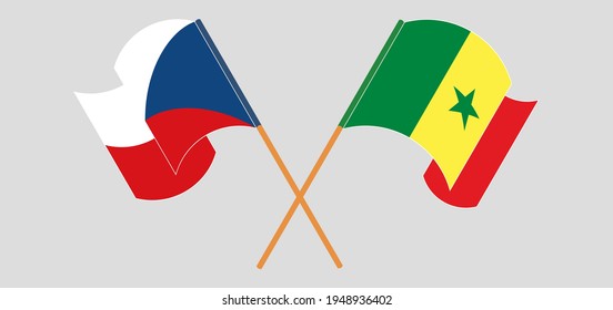 Banderas cruzadas y ondeando banderas de la República Checa y el Senegal
