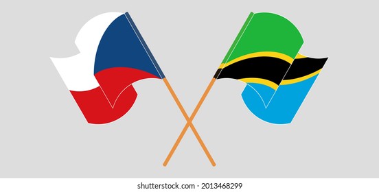 Banderas cruzadas y ondeando banderas de la República Checa y Tanzania
