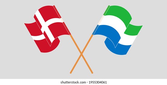 Crossed and waving flags of Denmark and Sierra Leone