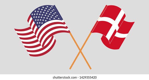 Crossed and waving flags of Denmark and USA