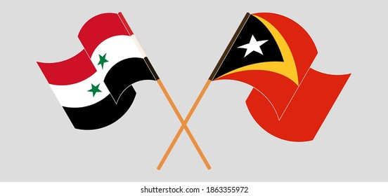 Crossed and waving flags of East Timor and Syria