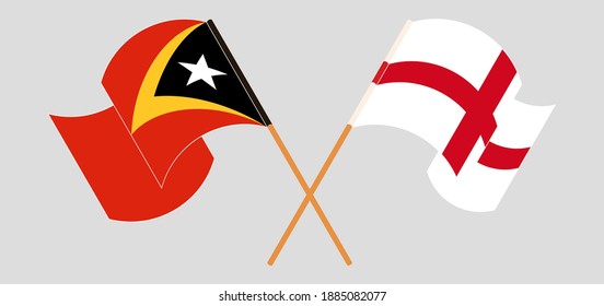 Crossed and waving flags of East Timor and England