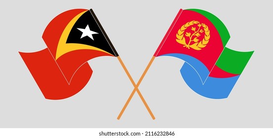 Crossed and waving flags of East Timor and Eritrea. Vector illustration
