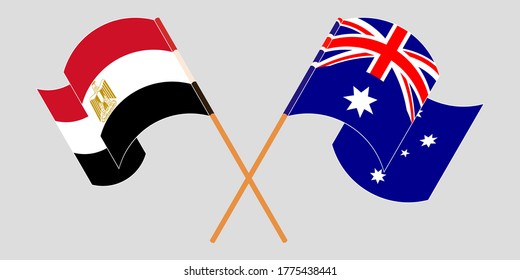 Crossed and waving flags of Egypt and Australia