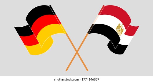 Banderas cruzadas y ondeando banderas de Egipto y Alemania