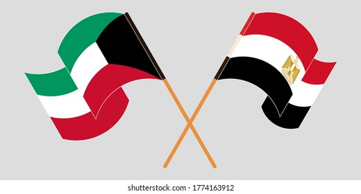 Banderas cruzadas y ondeando banderas de Egipto y Kuwait