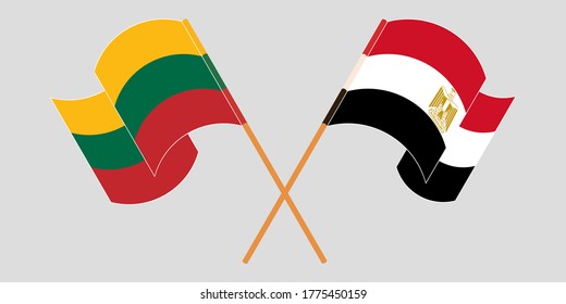 Crossed and waving flags of Egypt and Lithuania