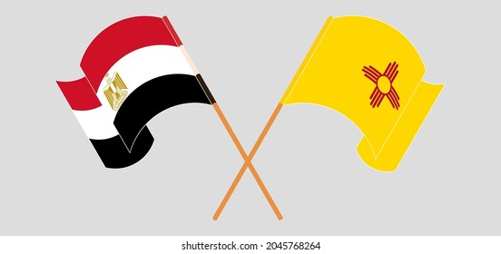 Crossed and waving flags of Egypt and the State of New Mexico