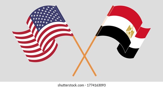 Banderas cruzadas y ondeando banderas de Egipto y Estados Unidos