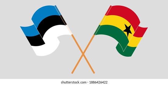 Crossed and waving flags of Estonia and Ghana