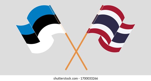 Crossed and waving flags of Estonia and Thailand