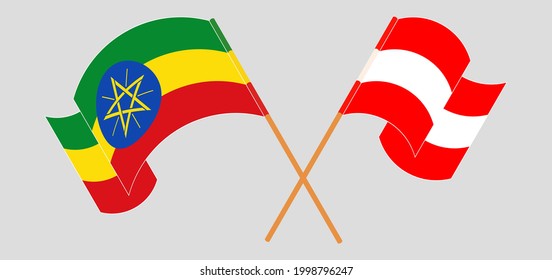 Banderas cruzadas y ondeando banderas de Etiopía y Austria