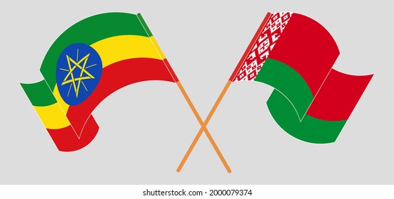 Crossed and waving flags of Ethiopia and Belarus.