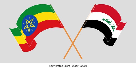 Crossed and waving flags of Ethiopia and Iraq
