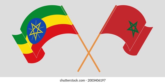 Crossed and waving flags of Ethiopia and Morocco