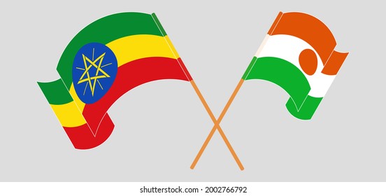 Crossed and waving flags of Ethiopia and Niger