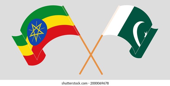 Crossed and waving flags of Ethiopia and Pakistan