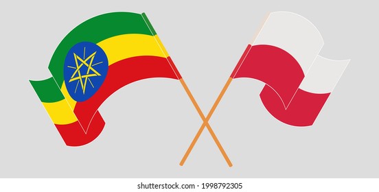 Crossed and waving flags of Ethiopia and Poland