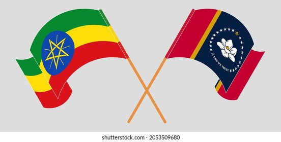 Crossed and waving flags of Ethiopia and the State of Mississippi