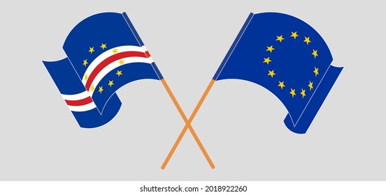 Crossed and waving flags of the European Union and Cape Verde