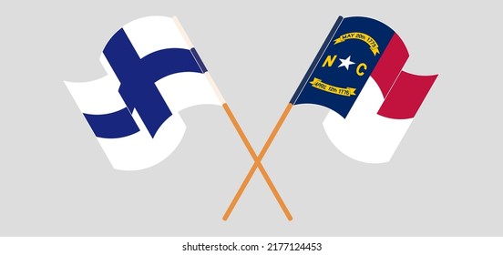 Crossed and waving flags of Finland and The State of North Carolina. Vector illustration
