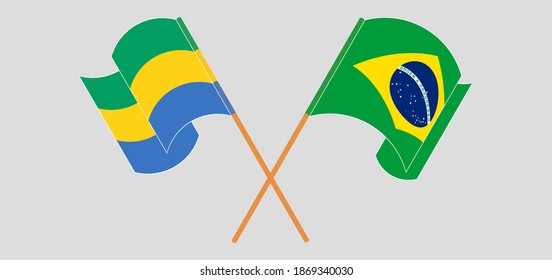 Crossed and waving flags of Gabon and Brazil