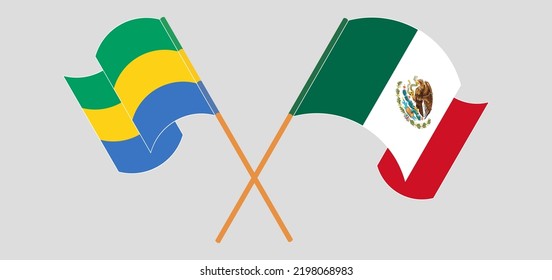 Crossed and waving flags of Gabon and Mexico. Vector illustration
