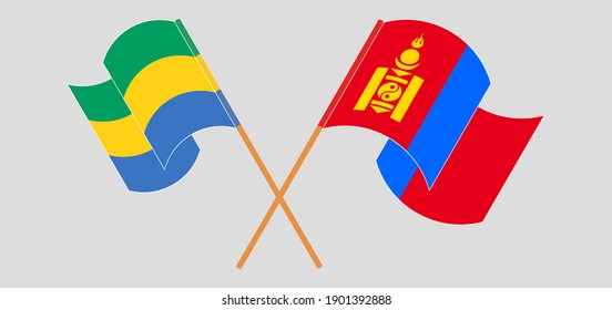 Crossed and waving flags of Gabon and Mongolia