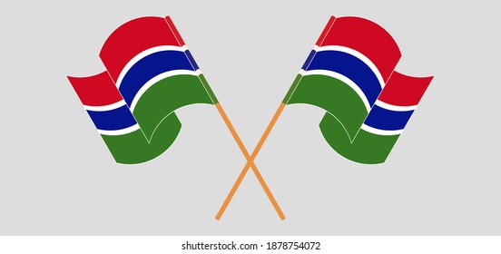 Banderas cruzadas y ondeando banderas de Gambia