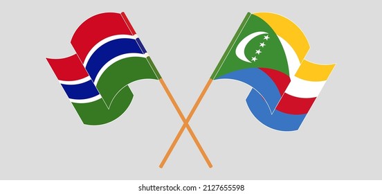 Crossed and waving flags of the Gambia and Comoros. Vector illustration
