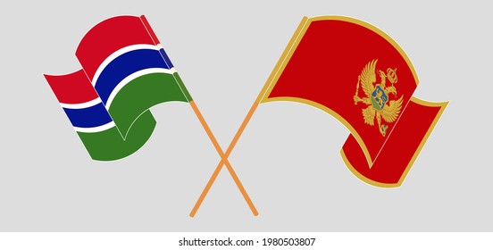 Crossed and waving flags of the Gambia and Montenegro