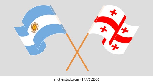 Crossed and waving flags of Georgia and Argentina