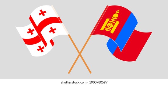 Banderas cruzadas y ondeando banderas de Georgia y Mongolia
