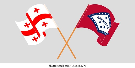 Cruzando y ondeando banderas de Georgia y El Estado de Arkansas. Ilustración del vector
