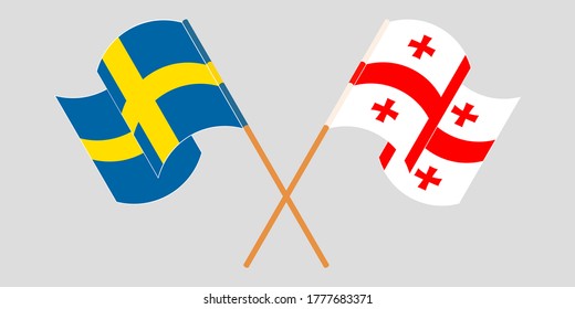 Crossed and waving flags of Georgia and Sweden