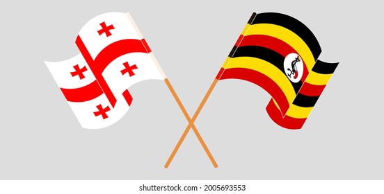 Gekreuzte und wehende Flaggen Georgiens und Ugandas
